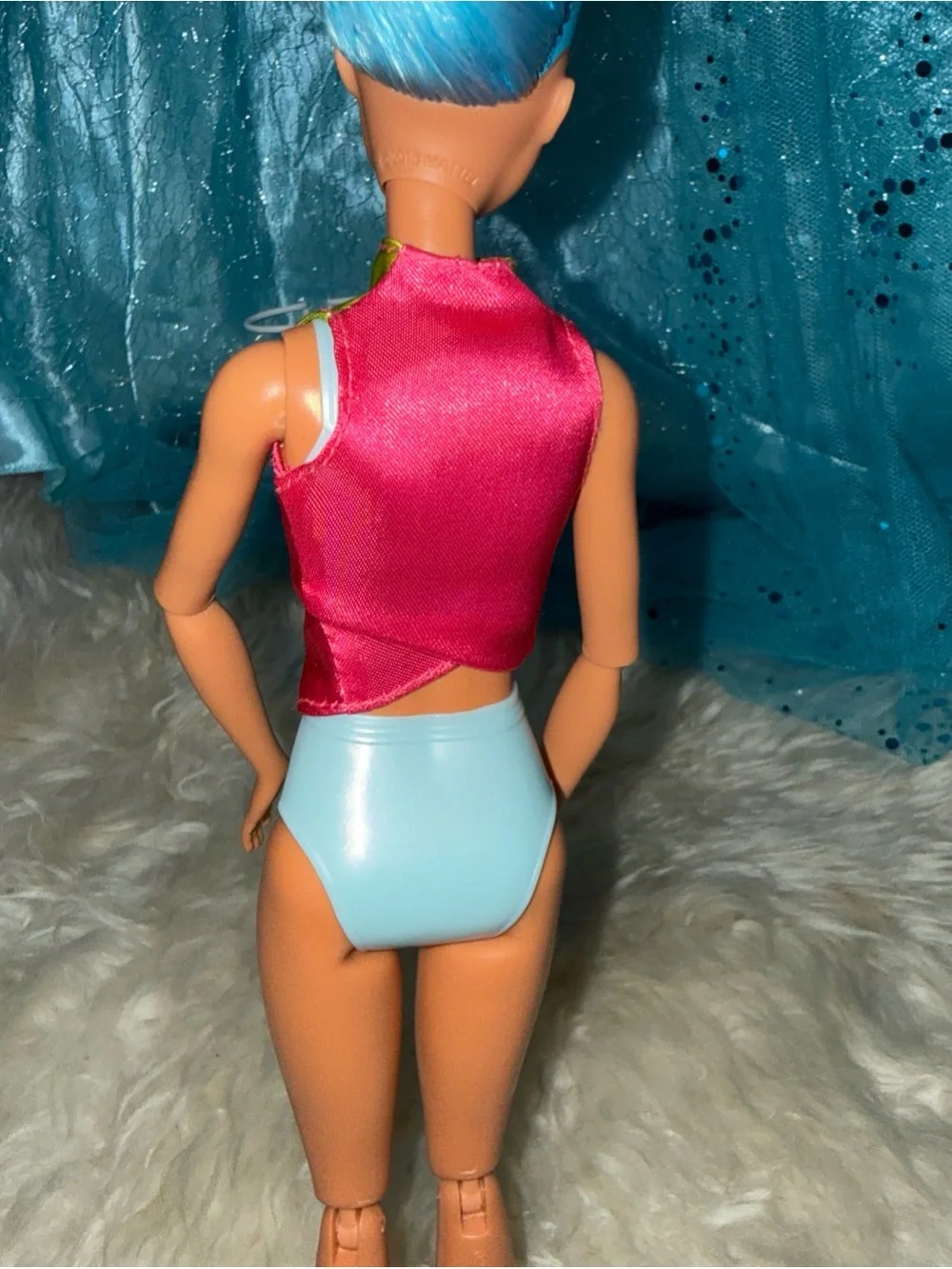 Barbie blue hair shaved head in life jacket top